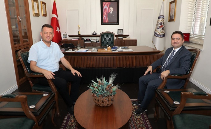 Rektör Türkdoğan Kaymakam Ürkmezer'i makamında ziyaret etti